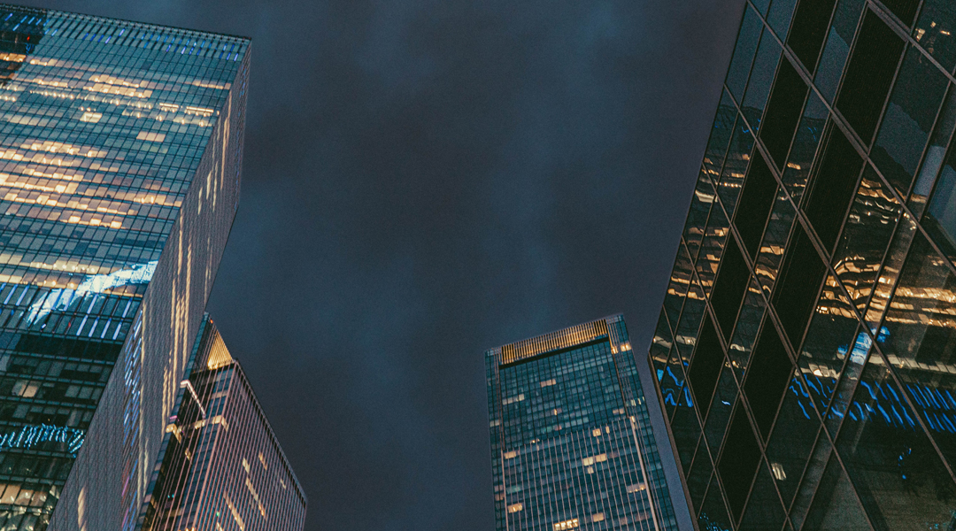 Office buildings illuminated at dusk